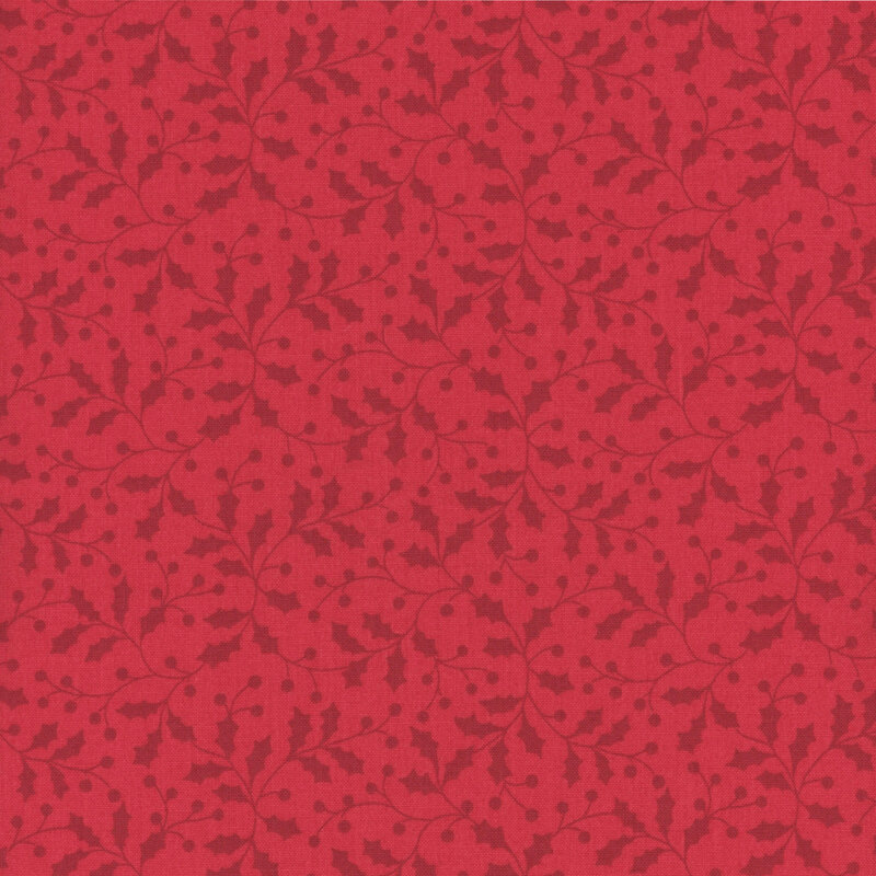 A ruby red fabric featuring deep red vines with holly leaves and berries