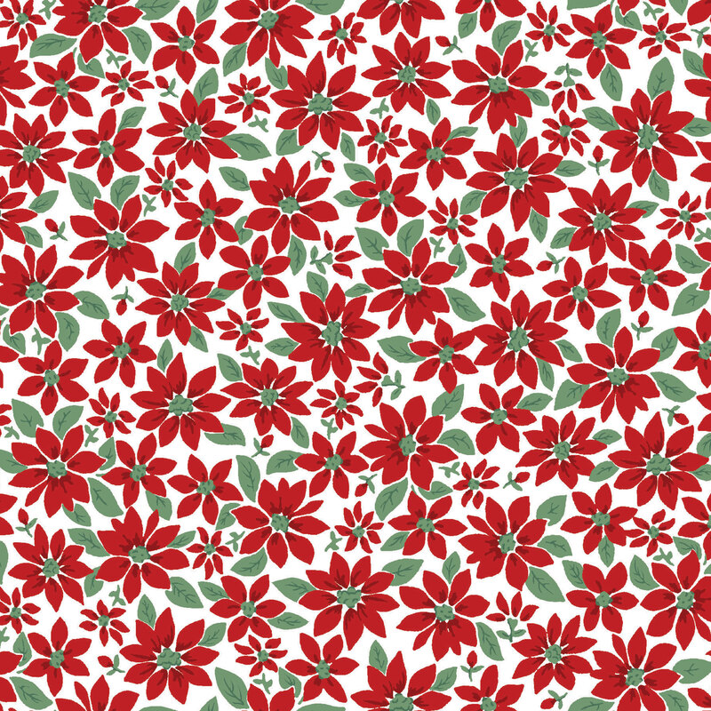 White fabric with crimson poinsettias and medium green leaves 