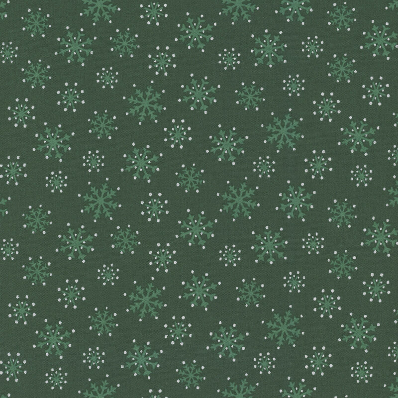 Spruce green fabric with medium green snowflakes and silver dots