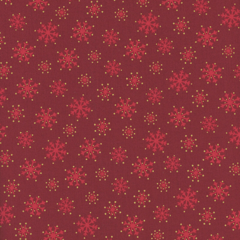 Crimson fabric with Christmas red snowflakes and gold dots