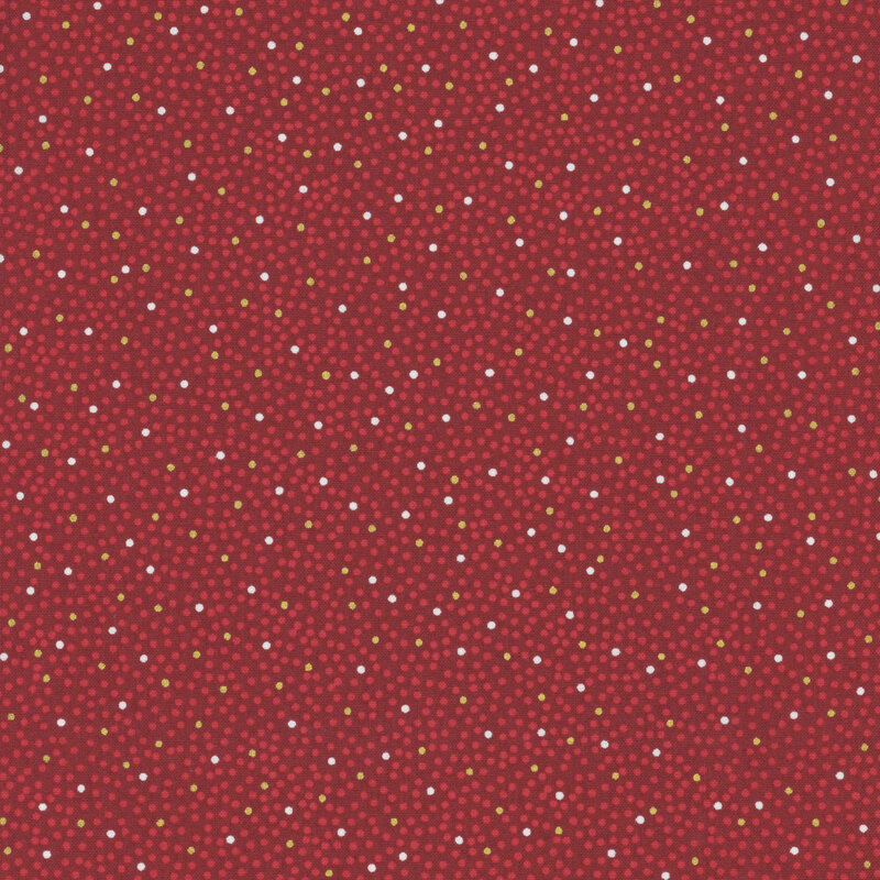 Maroon fabric with a pattern of dense scarlet and gold and silver metallic dots