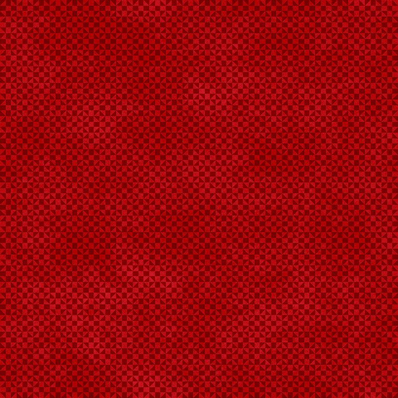 Mottled, tonal maroon fabric with a small geometric pattern