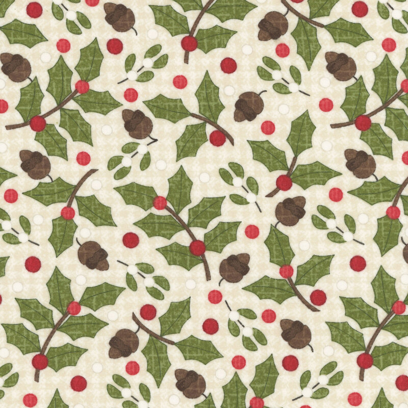 Holly, mistletoe, and acorns tossed on a textured cream background