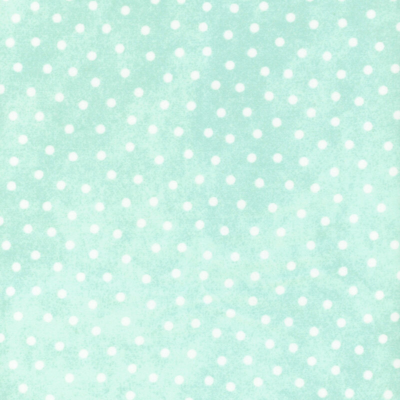 white polka dots scattered on a textured pale aqua background