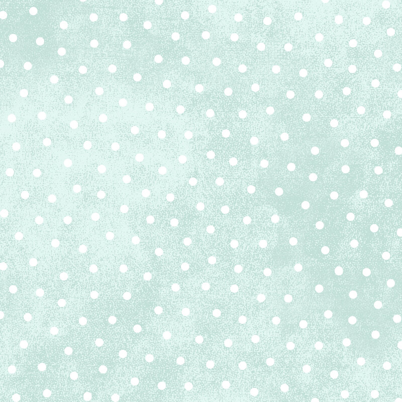 white polka dots scattered on a textured pale aqua background