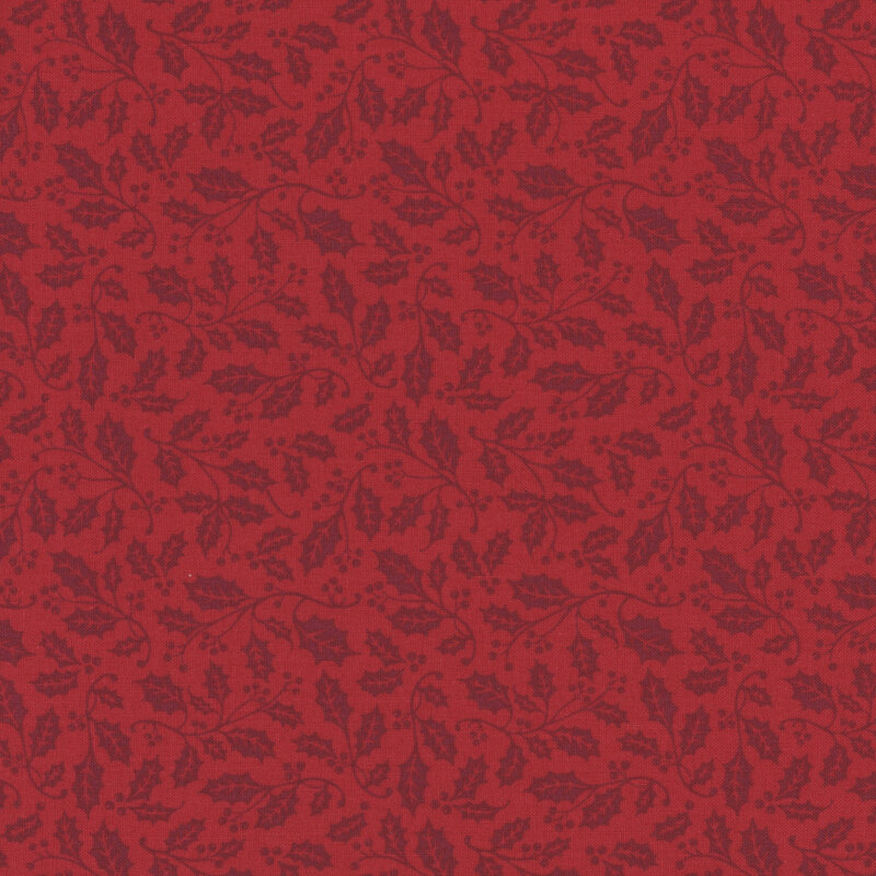 Ruby red fabric featuring vines of holly and berries.