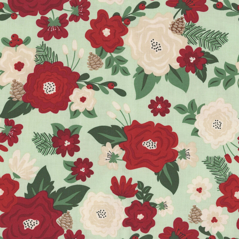 A mint fabric with red and white flowers, pinecones, pine branches, and leaves. 
