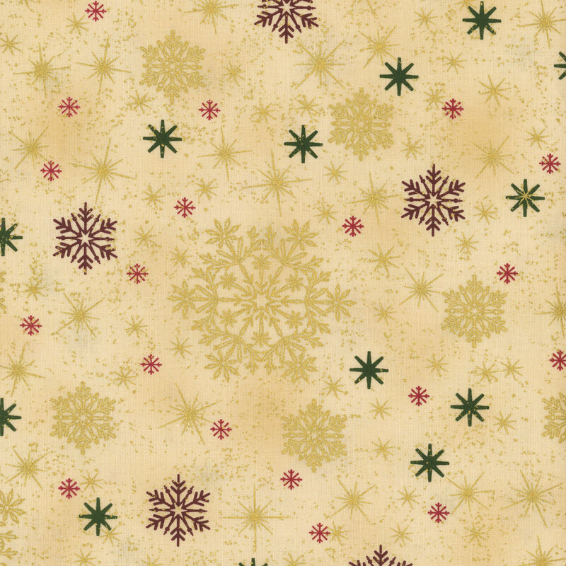 Mottled tan fabric with multicolored, scattered snowflakes and stars with gold metallic accents.