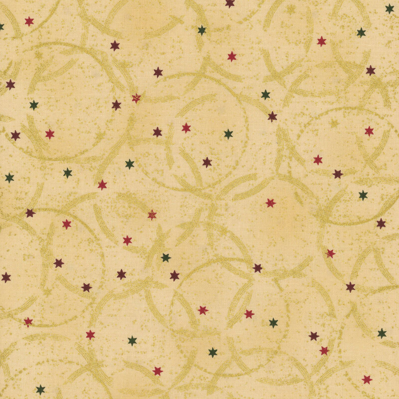 Mottled tan fabric with tiny multicolored stars and incomplete, overlapping circles with gold metallic accents.
