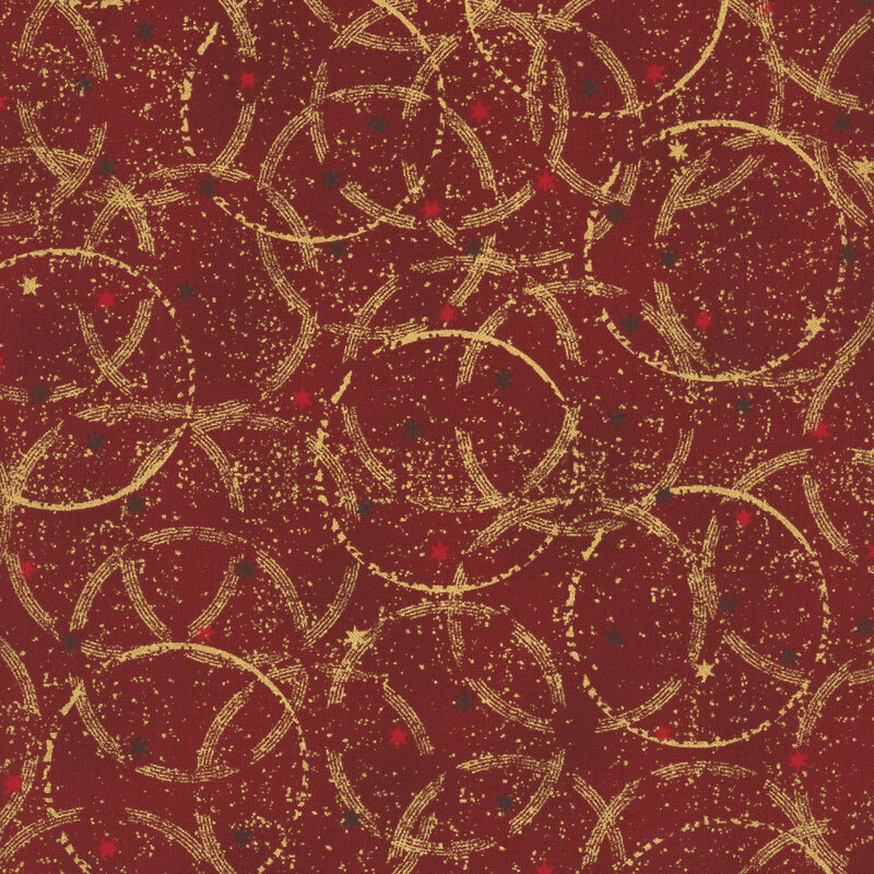 Mottled red fabric with small scattered stars and overlapping, incomplete circles with gold metallic accents.