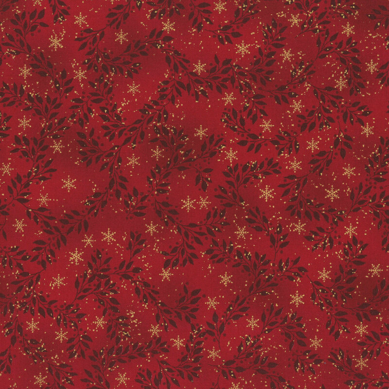 Mottled red fabric with tiny scattered snowflakes and branching dark leaves and vines with gold metallic accents.