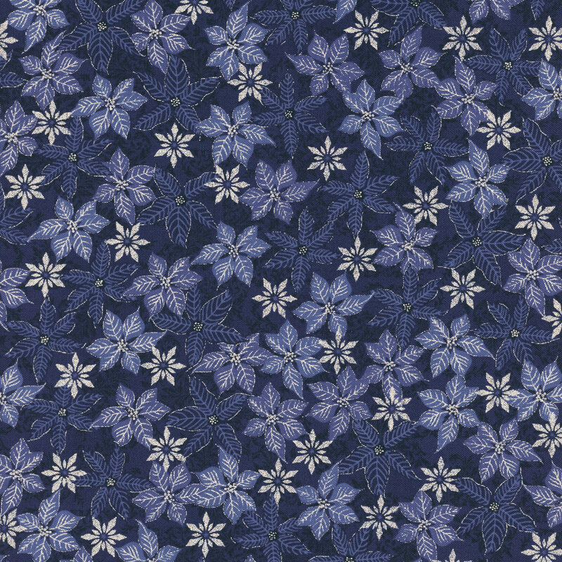 Mottled dark blue fabric with small scattered snowflakes and blue poinsettia flowers with silver metallic accents.