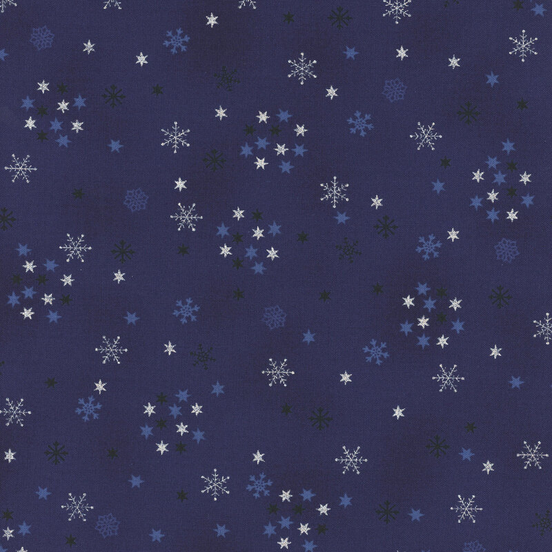 Mottled dark blue fabric with tiny scattered stars and snowflakes with silver metallic accents.
