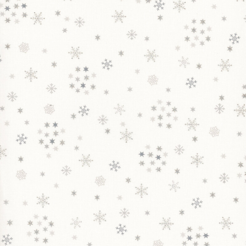 Off-white fabric with small scattered snowflakes and stars with silver metallic accents.