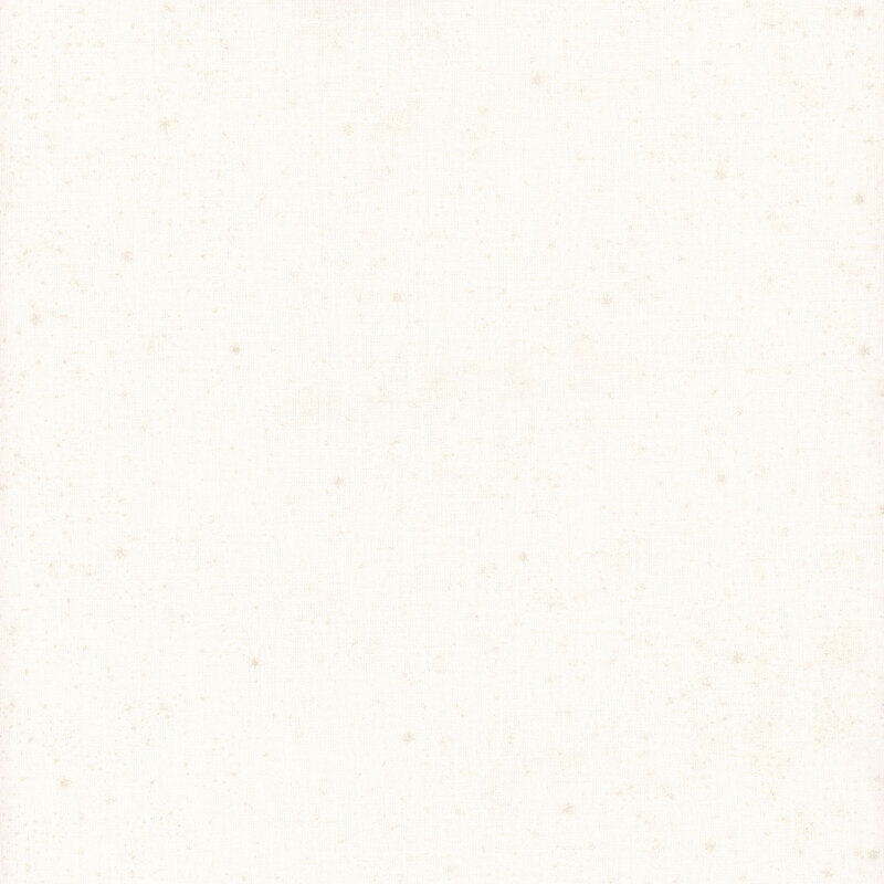 Cream fabric with tiny scattered stars with pearlized accents.