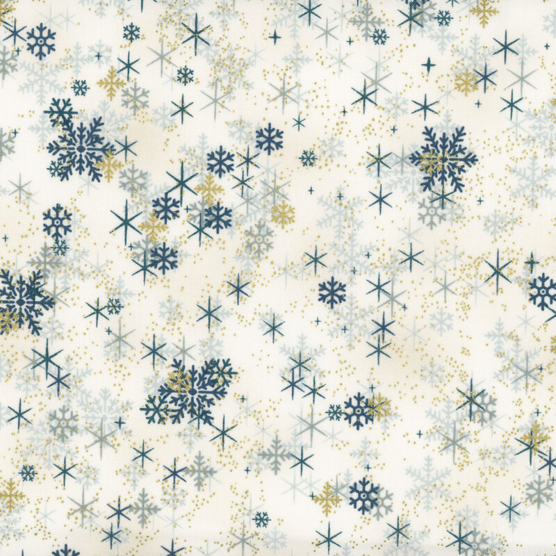 Mottled cream fabric with scattered snowflakes, stars, and lightly flecked gold metallic.