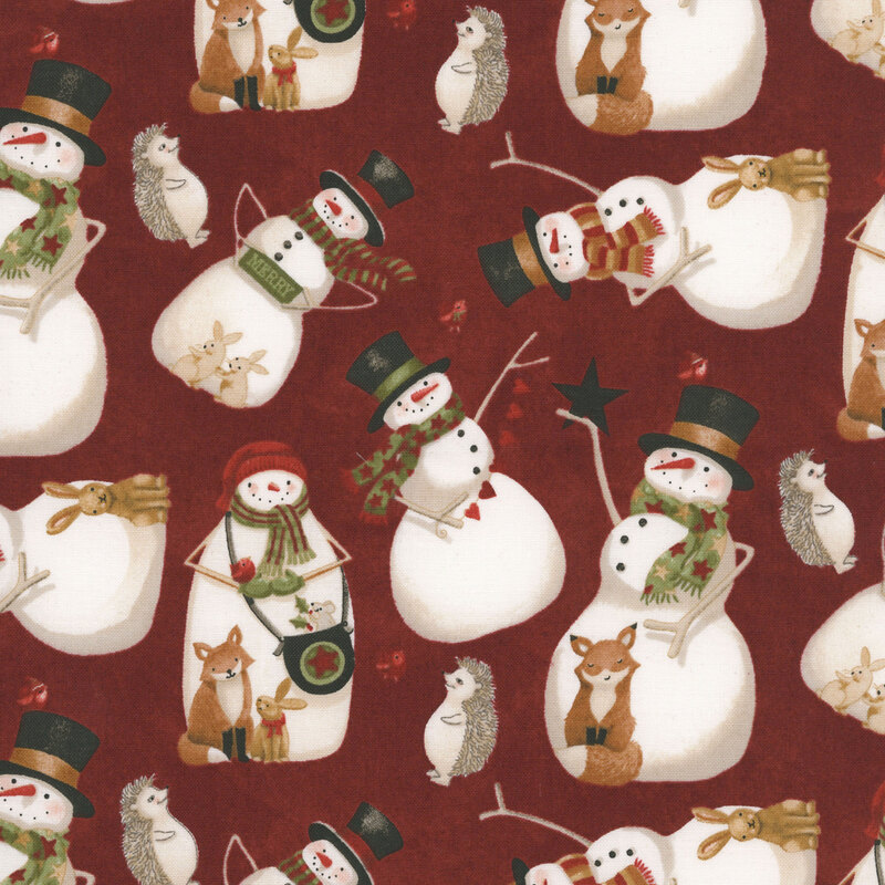 Textured maroon background featuring snowmen in hats and scarves with small woodland creatures and little red birds