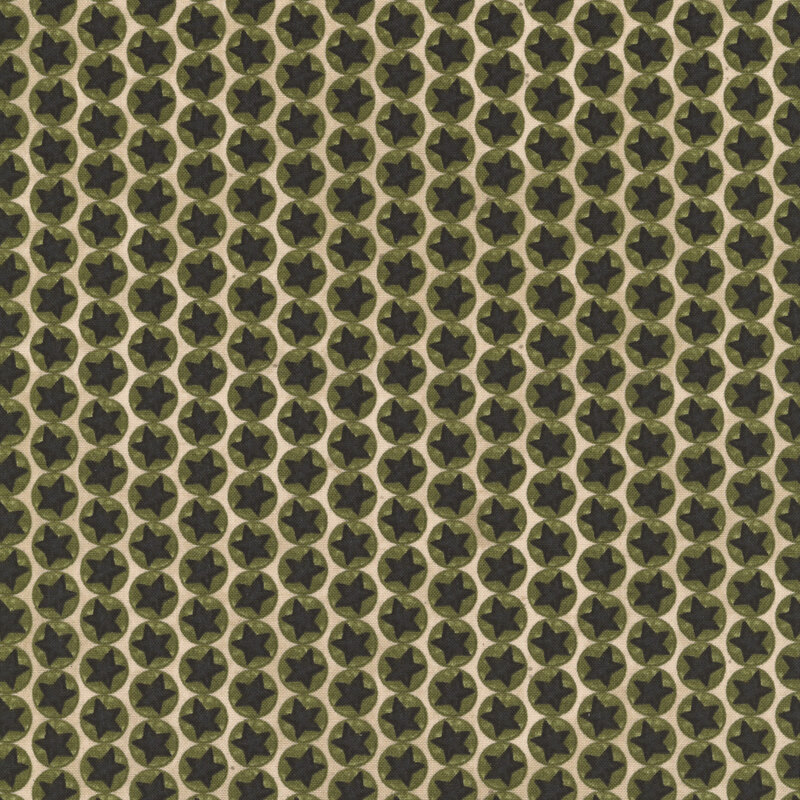 Tan fabric with lines of green circles and black stars in the center