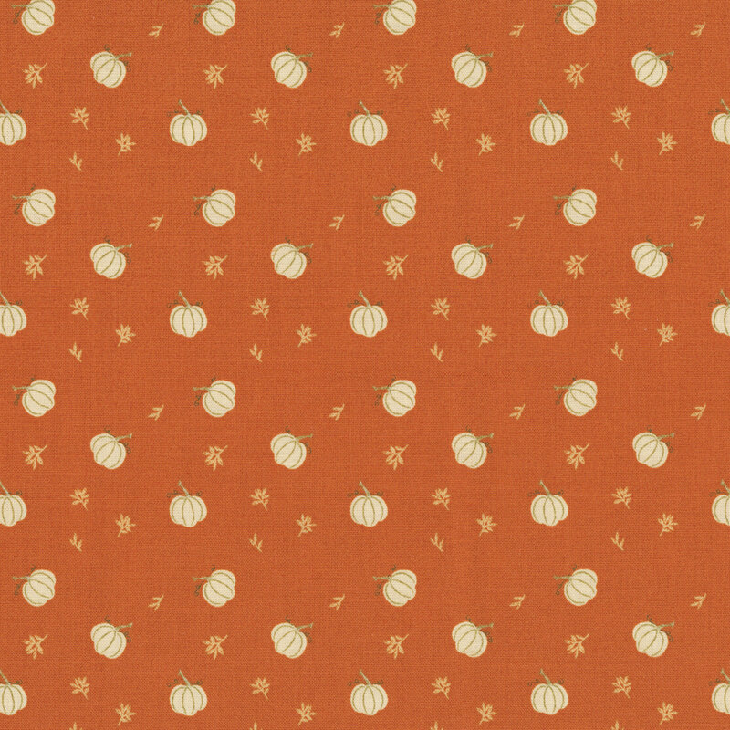 Orange fabric with a a ditsy pattern of white pumpkins and small white twigs