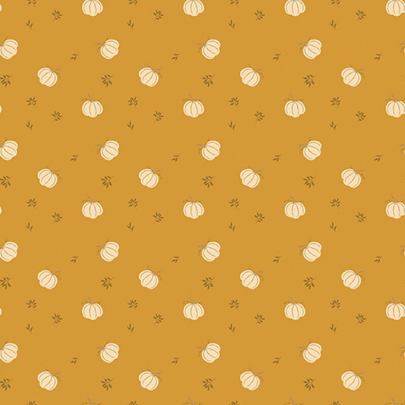 Gold fabric with a a ditsy pattern of white pumpkins and small brown twigs