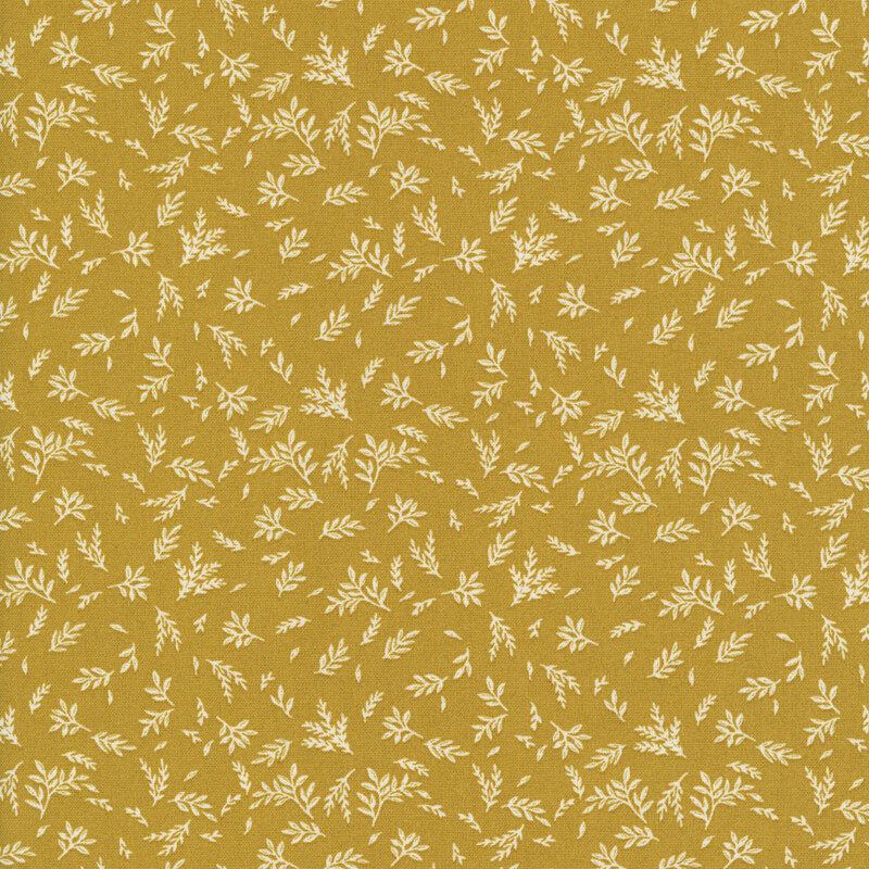 Mustard yellow fabric with a pattern of tan leafy sprigs