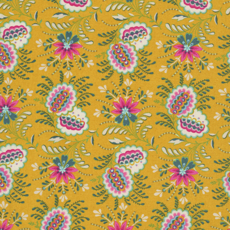 Mustard yellow fabric featuring elaborate clusters of flowers and leaves in bright pink, white, and teal.