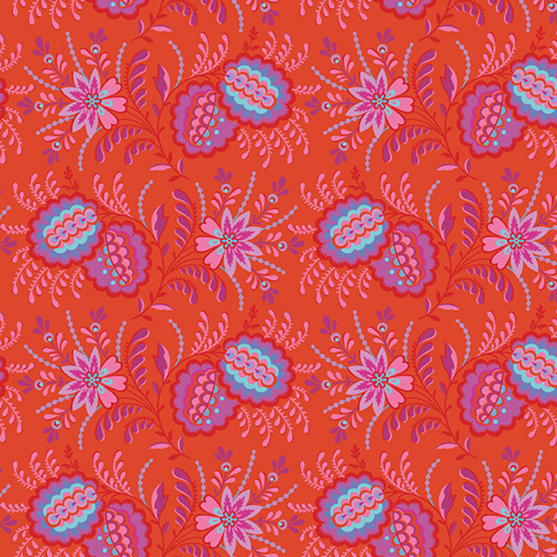 Bright red-orange abric featuring elaborate clusters of flowers and leaves in bright pink, purple, and aqua.