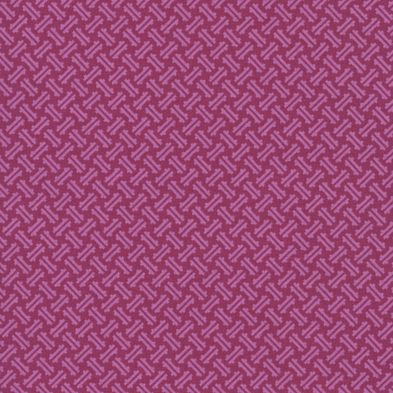 Geometric dashes on tonal magenta fabric.