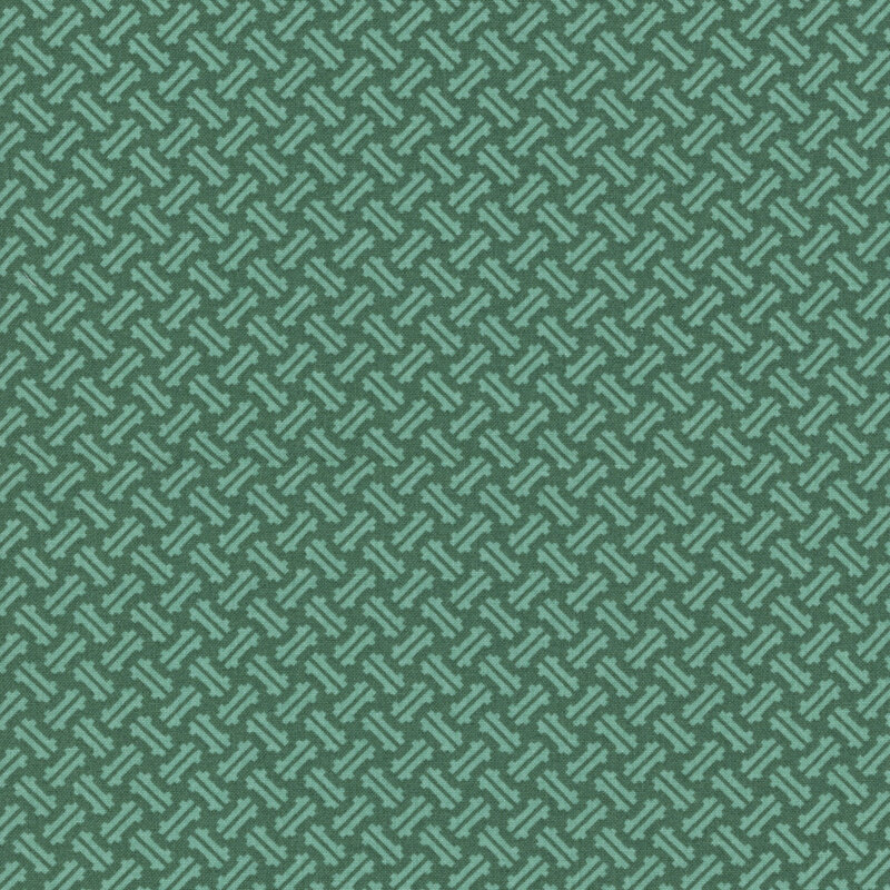 Geometric dashes on tonal jade green fabric.