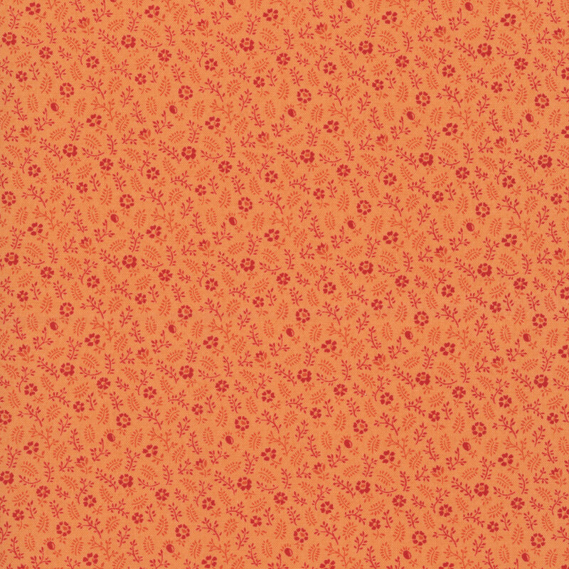 Orange fabric featuring calico florals and leaves.