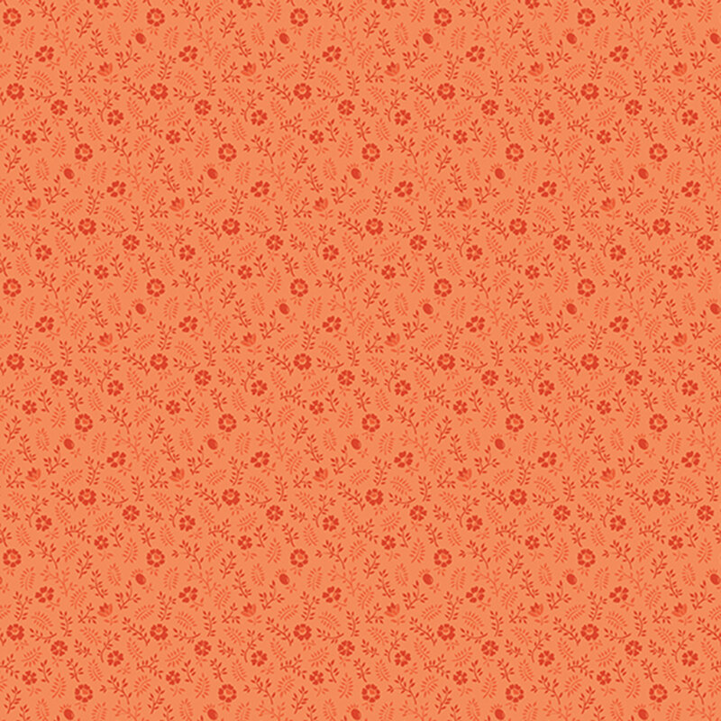 Bright orange fabric featuring calico florals and leaves.