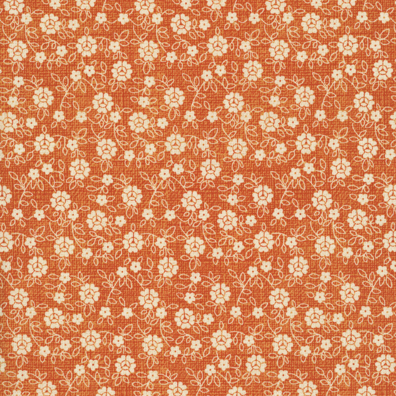 Woven textured pumpkin orange fabric with white florals