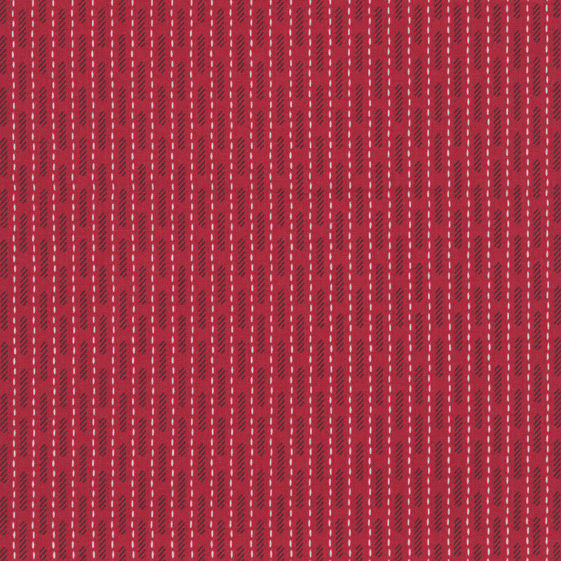 Scarlet fabric with vertical white dashes and a pattern of black diagonal lines