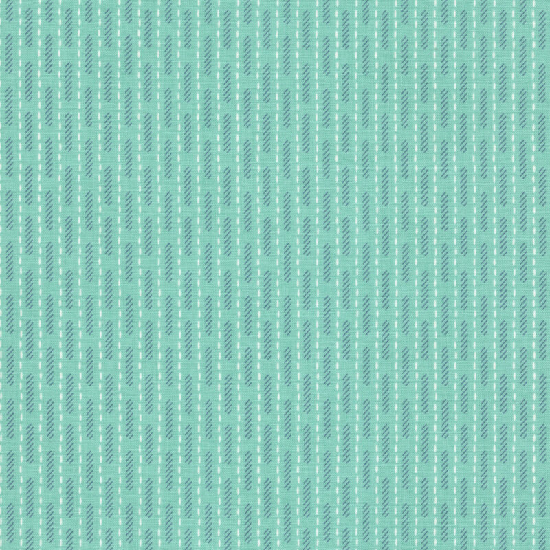 Turquoise fabric with vertical white dashes and a pattern of dark teal lines