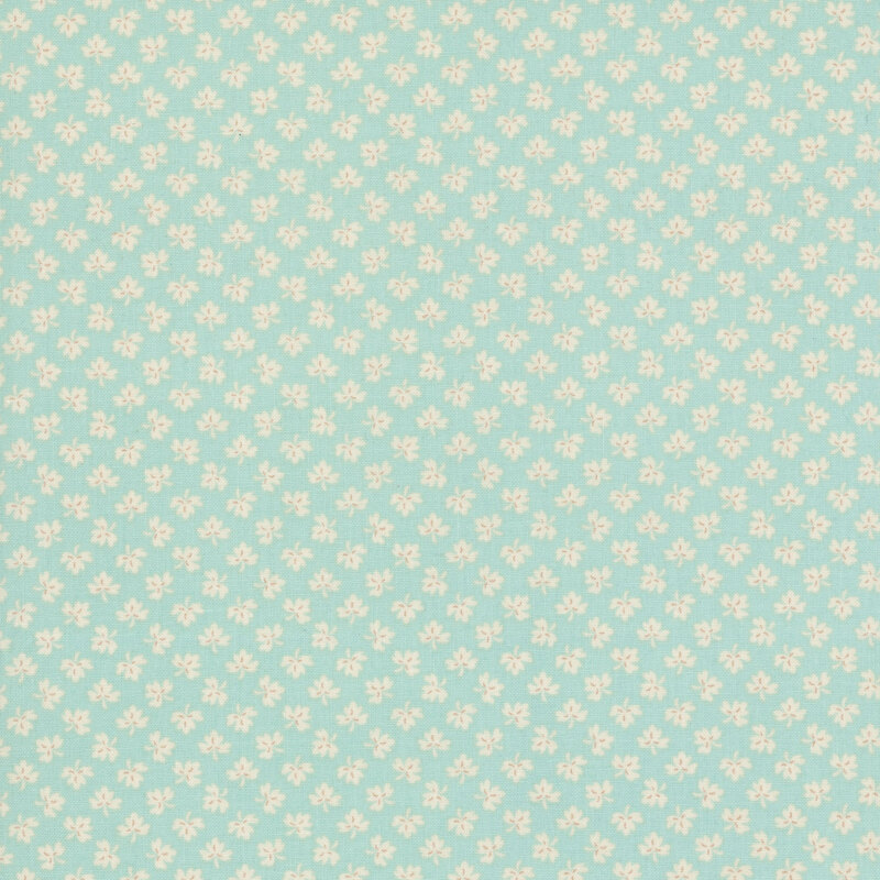 Light aqua fabric with ditsy white leaf pattern