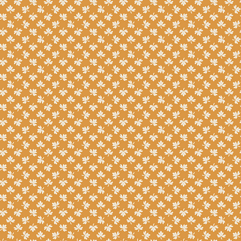Butterscotch yellow background with ditsy cream leaf pattern