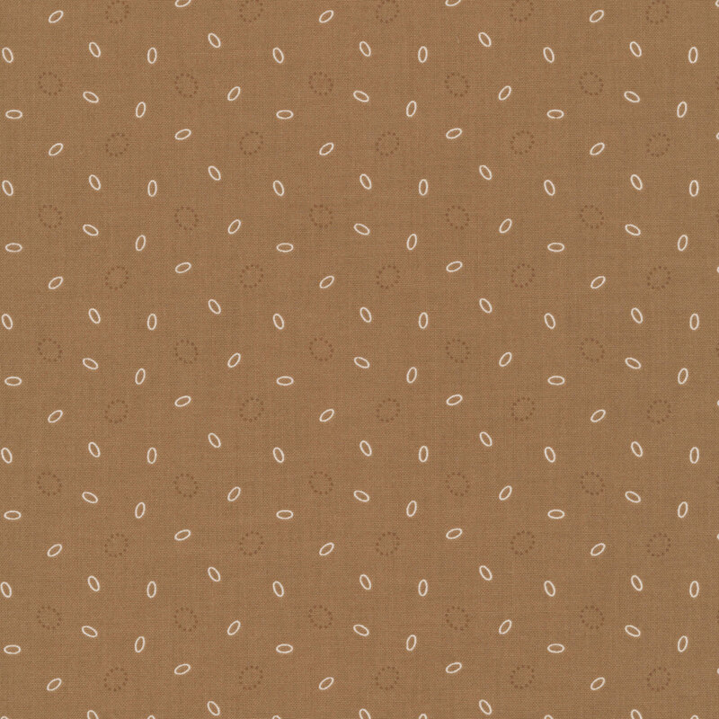 Maple brown background with a scattered pattern of white ovals and brown dotted circles