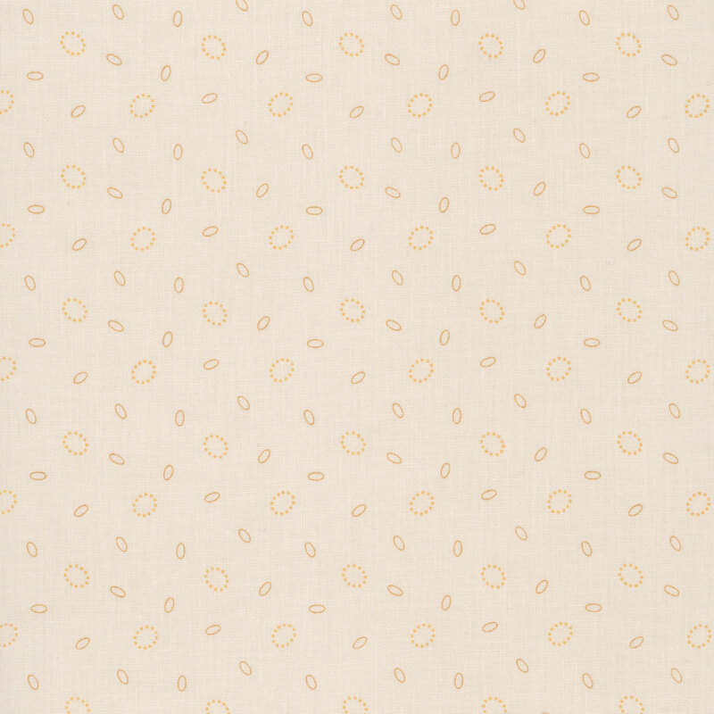 Latte white fabric with a scattered pattern of mustard yellow ovals and gold dotted circles