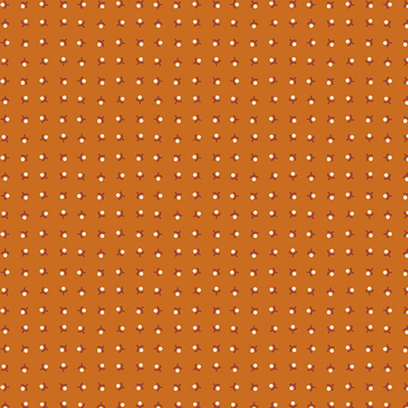 Dark gold background with a ditsy pattern of white minimalistic flowers and dark red stems
