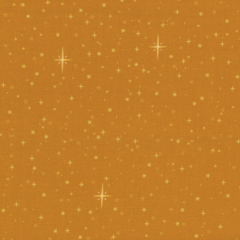 Gold fabric tossed with white stars.