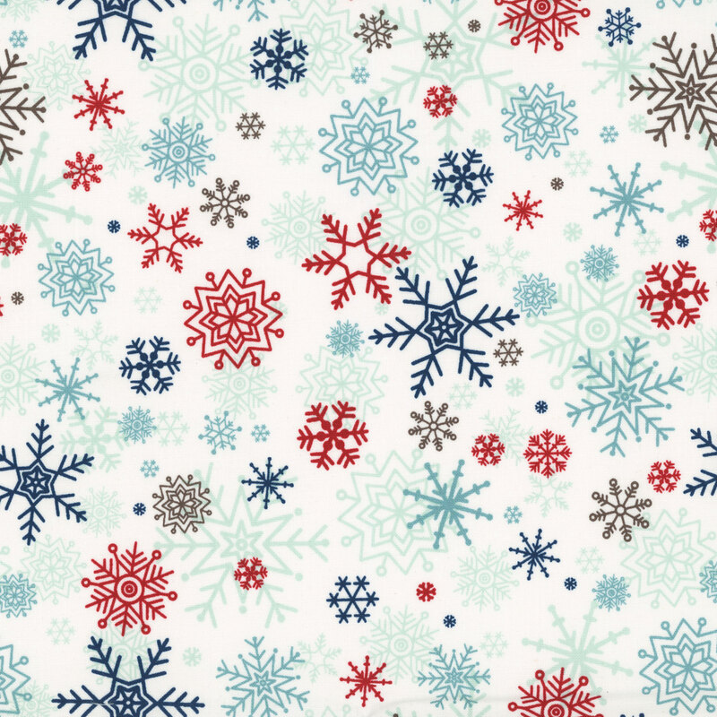 White fabric with a pattern of large snowflakes in blue, aqua, and red.