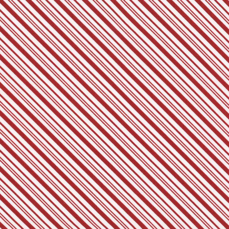 White fabric with a diagonal pattern of red stripes in varying widths.