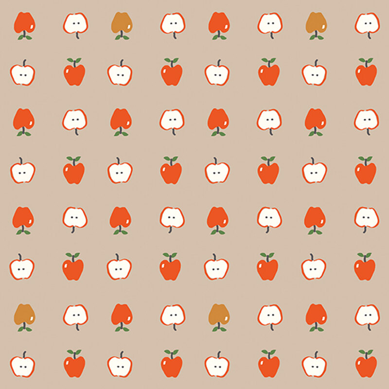 Taupe brown fabric with neat rows of red and gold apples both full and cut in half.