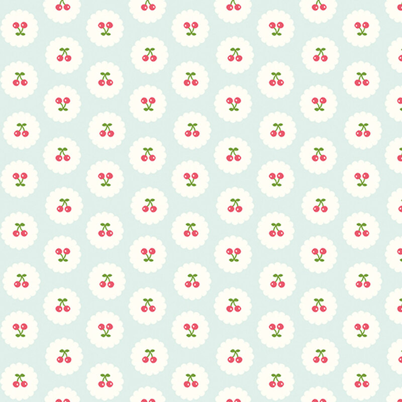 Pastel blue fabric with neat rows of upright and upside-down pairs of cherries on small white scalloped circles.