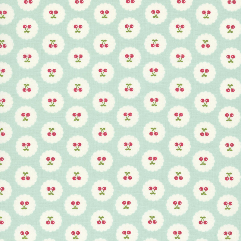 Pale aqua fabric with neat rows of upright and upside-down pairs of cherries on small white scalloped circles.