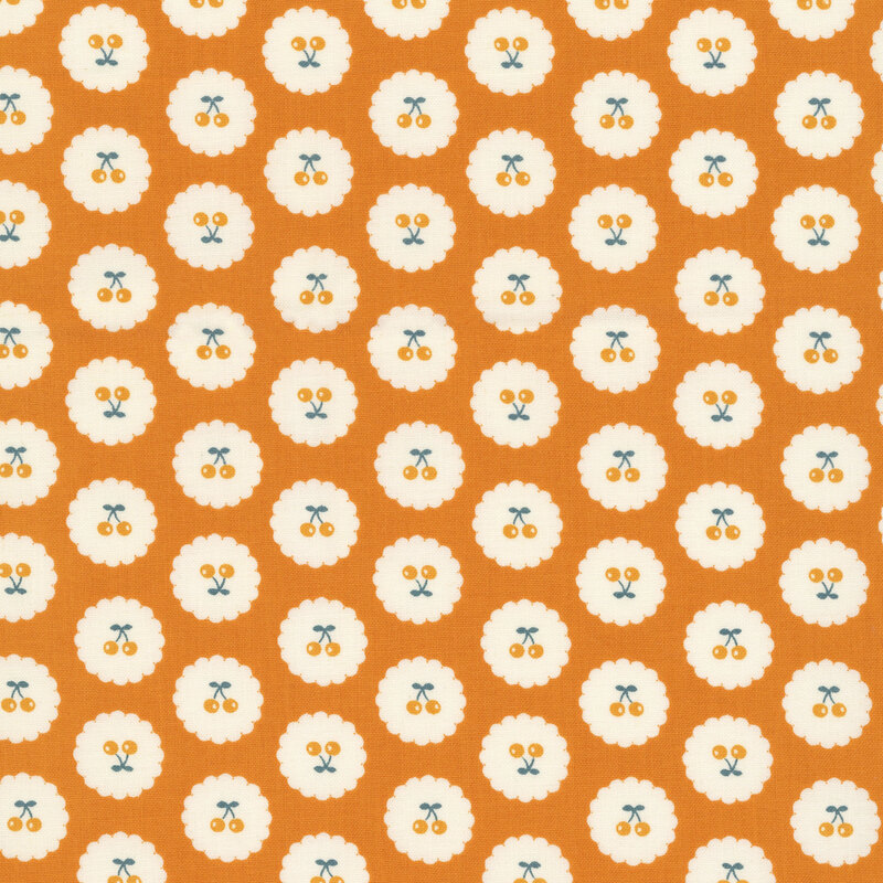 Bright orange fabric with neat rows of upright and upside-down pairs of cherries on small white scalloped circles.