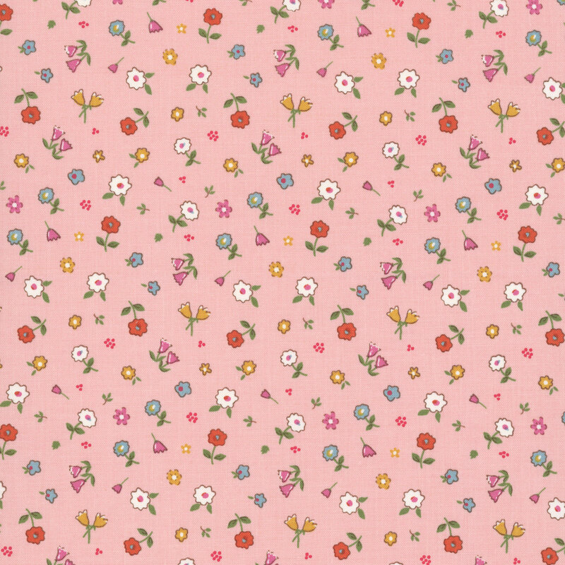 Pink fabric with small-scale, tossed florals of varying types.
