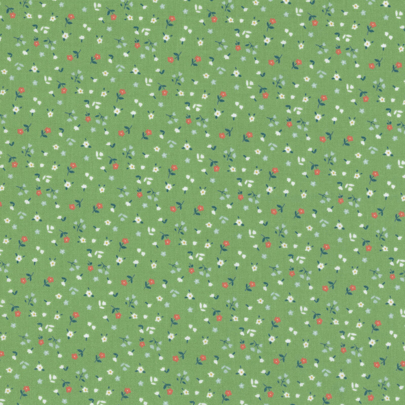 Green fabric with small-scale tossed florals of varying types.