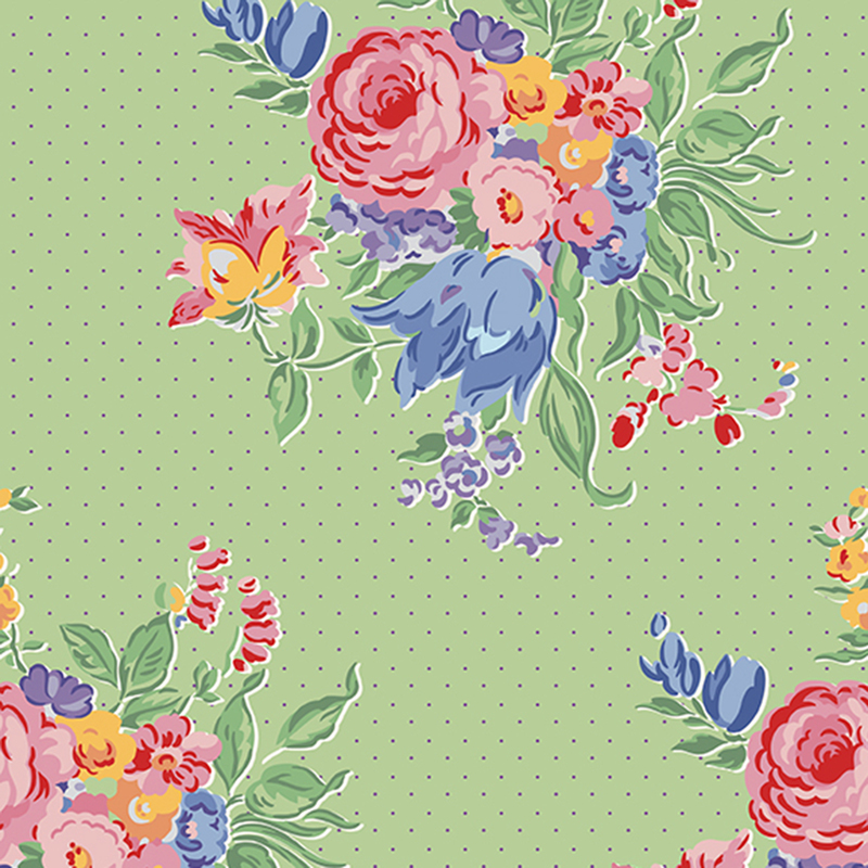 Dotted light green fabric with clusters of giant pink, purple, and yellow bouquets.