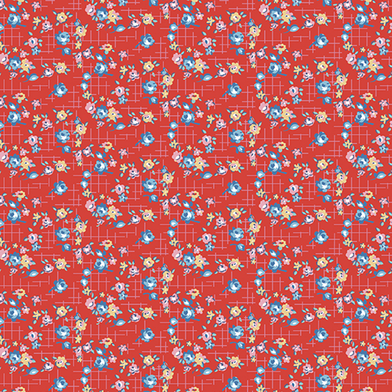 Red fabric with small blue, red, and yellow roses on a pink cross-hatched background.